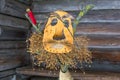 MeteÃâ i mumming mask with beard, made of rods, twigs and bark, staying at a log hut